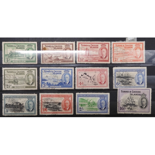 7153 - JAMAICA, TURKS & CAICOS ISLANDS a collection on 7 stock book pages with JAMAICA 1870 1/- and 2/-... 