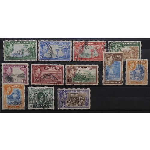 7153 - JAMAICA, TURKS & CAICOS ISLANDS a collection on 7 stock book pages with JAMAICA 1870 1/- and 2/-... 