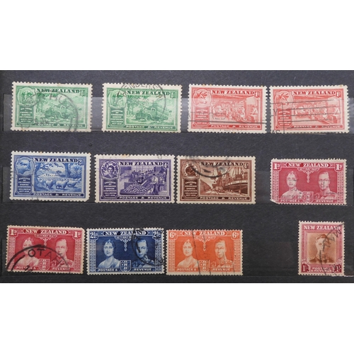 7170 - NEW ZEALAND an unorganised collection i a blue stock book, well worth looking through, to include Ch... 