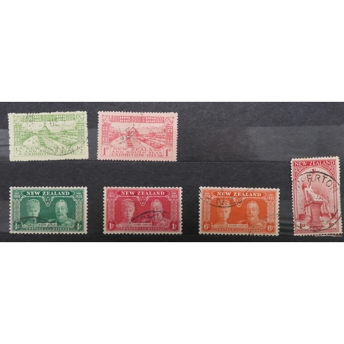 7170 - NEW ZEALAND an unorganised collection i a blue stock book, well worth looking through, to include Ch... 