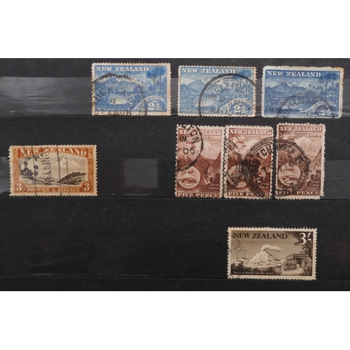 7170 - NEW ZEALAND an unorganised collection i a blue stock book, well worth looking through, to include Ch... 