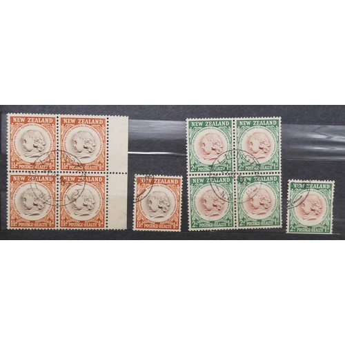 7170 - NEW ZEALAND an unorganised collection i a blue stock book, well worth looking through, to include Ch... 