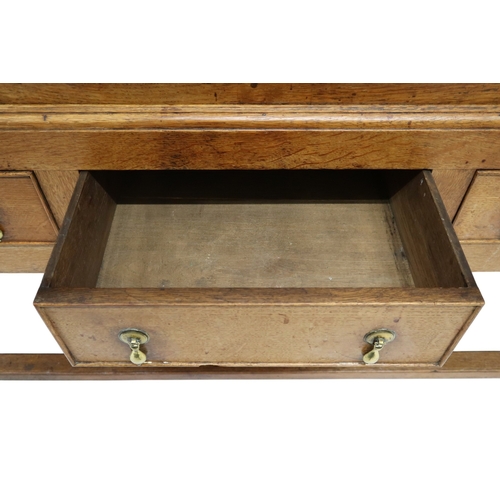 2036 - A LATE 19TH/EARLY 20TH CENTURY BLONDE OAK LARDER CABINETwith moulded cornice top over pair of glazed... 