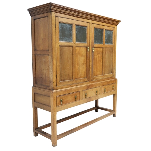 2036 - A LATE 19TH/EARLY 20TH CENTURY BLONDE OAK LARDER CABINETwith moulded cornice top over pair of glazed... 