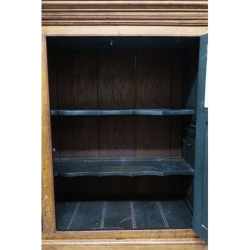 2036 - A LATE 19TH/EARLY 20TH CENTURY BLONDE OAK LARDER CABINETwith moulded cornice top over pair of glazed... 