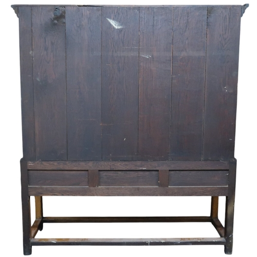 2036 - A LATE 19TH/EARLY 20TH CENTURY BLONDE OAK LARDER CABINETwith moulded cornice top over pair of glazed... 
