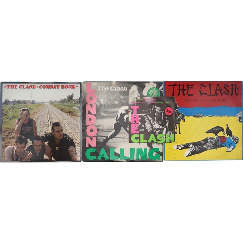 2597 - THE CLASHA Group of LP vinyl to include London Calling double album with inner sleeve, Give Em Enoug... 