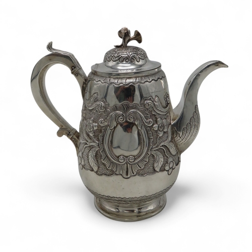 2301 - AN IMPRESSIVE GEORGE IV IRISH SILVER TEAPOTmaker's mark MF, Dublin 1820, of baluster form, engraved ... 