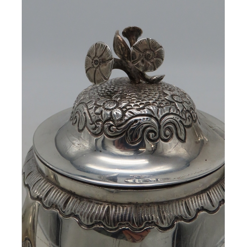 2301 - AN IMPRESSIVE GEORGE IV IRISH SILVER TEAPOTmaker's mark MF, Dublin 1820, of baluster form, engraved ... 