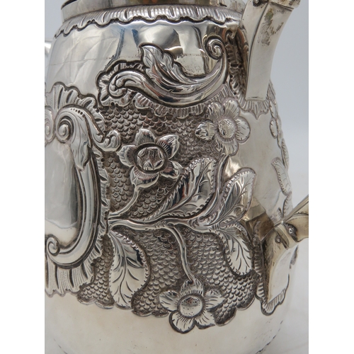 2301 - AN IMPRESSIVE GEORGE IV IRISH SILVER TEAPOTmaker's mark MF, Dublin 1820, of baluster form, engraved ... 