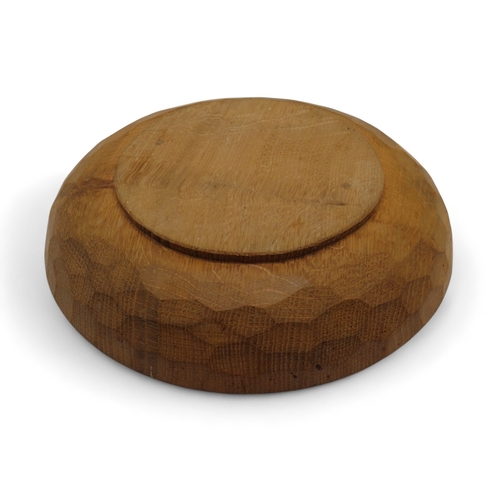 2154 - WORKSHOP OF ROBERT 'MOUSEMAN' THOMPSON, KILBURNoak fruit bowl, of circular form with adzed finish an... 