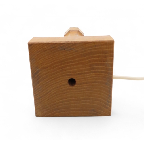 2155 - WORKSHOP OF ROBERT 'MOUSEMAN' THOMPSON, KILBURNoak table lamp, with carved mouse detail, 31cm high i... 