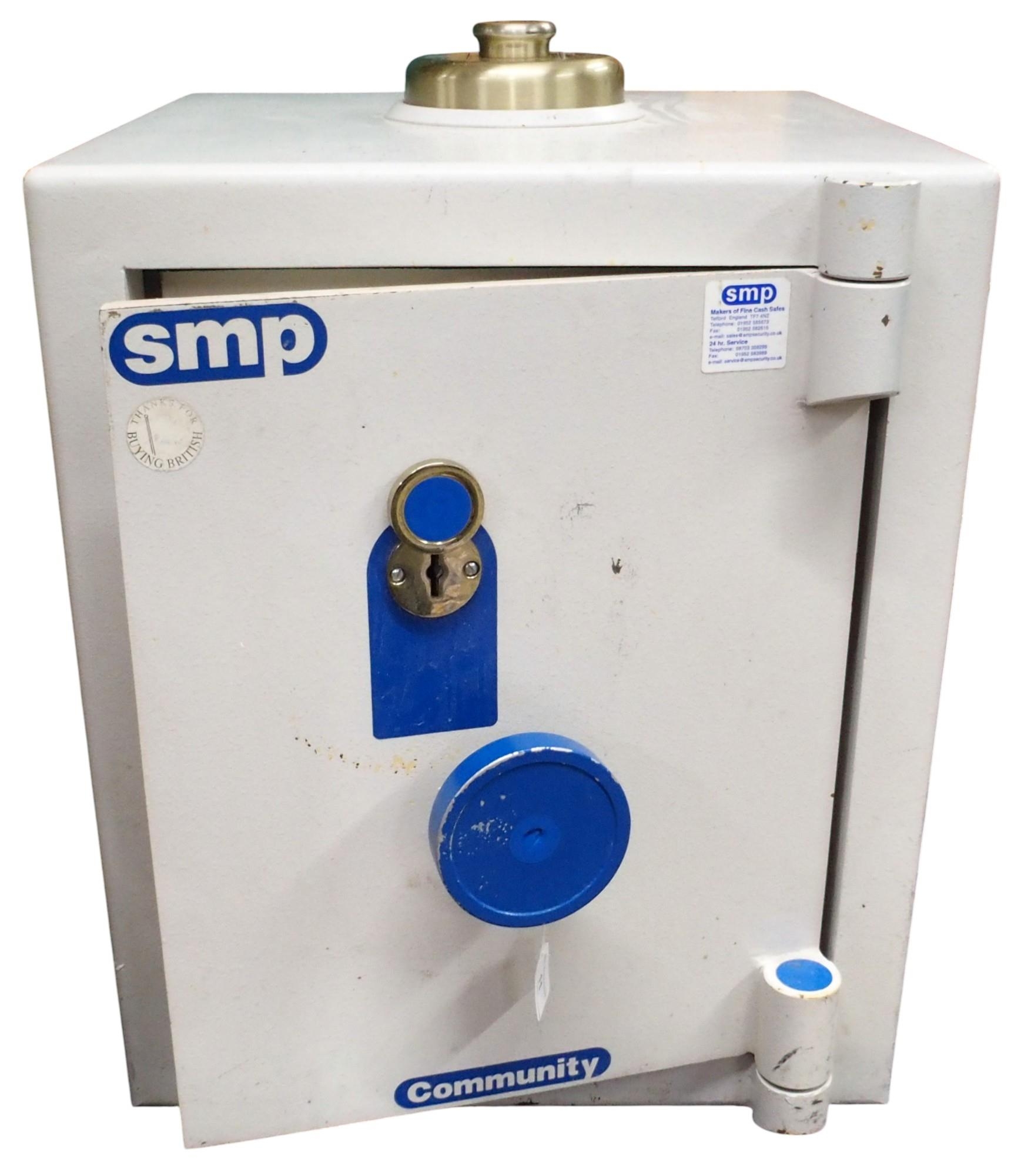 A late 20th/early 21st century SMP deposit safe with lockable drop top ...