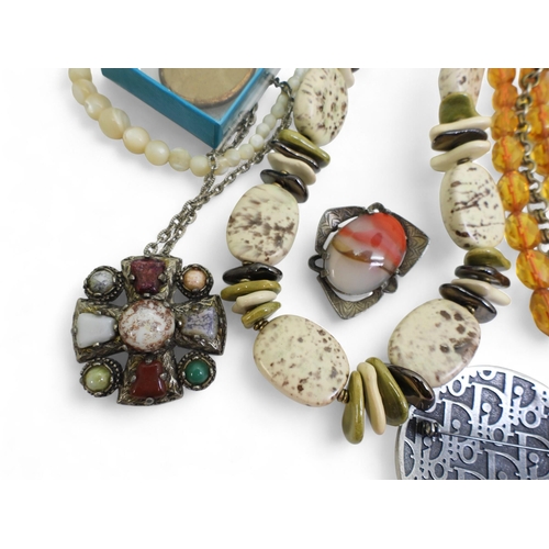 A pewter coloured John Galliano for Christian Dior shield