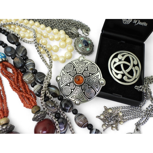 A pewter coloured John Galliano for Christian Dior shield