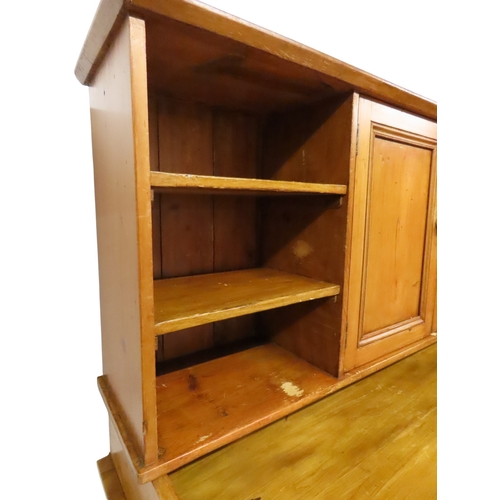 2003 - A 19TH CENTURY SCOTTISH PINE FARM HOUSE KITCHEN DRESSERwith central pair of cabinet doors flanked by... 