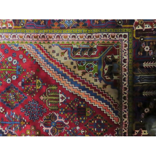 2014 - A RED GROUND DEEP PILE MEIMEH RUGwith multicoloured geometric diamond form central medallion and spa... 