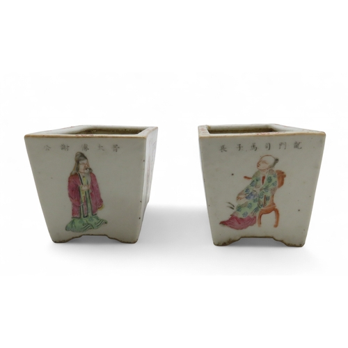 2251 - A PAIR OF CANTON RECTANGULAR FLOWER PLANTERS Each painted with officials beside panels of calligraph... 