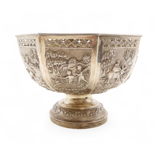 2263 - A CALCUTTA WHITE METAL OCTAGONAL ROSE BOWLDecorated with panels of hunting scenes, beneath pierced d... 