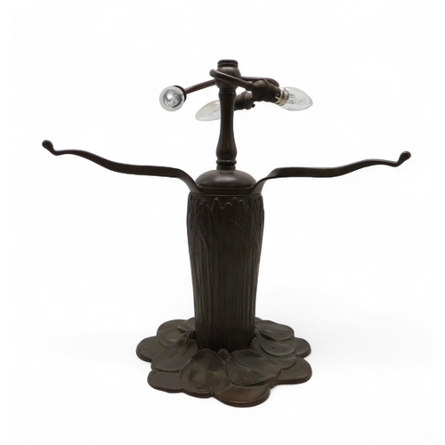 2162 - A 20TH CENTURY TIFFANY STYLE TABLE LAMPthe metal base with waterlilies and bullrushes, the stained a... 