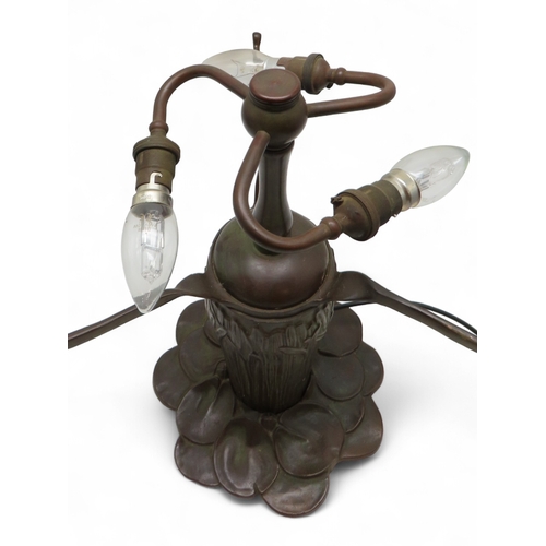 2162 - A 20TH CENTURY TIFFANY STYLE TABLE LAMPthe metal base with waterlilies and bullrushes, the stained a... 