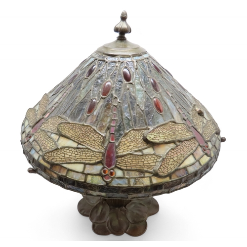 2162 - A 20TH CENTURY TIFFANY STYLE TABLE LAMPthe metal base with waterlilies and bullrushes, the stained a... 