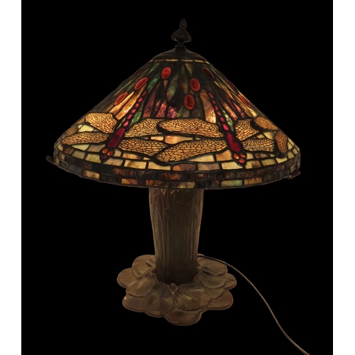 2162 - A 20TH CENTURY TIFFANY STYLE TABLE LAMPthe metal base with waterlilies and bullrushes, the stained a... 