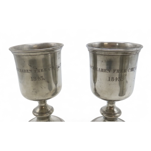 2164 - A PAIR OF SCOTTISH PEWTER FLAT-LID FLAGONS28cm high, together with a pair of large wine goblets, 22c... 