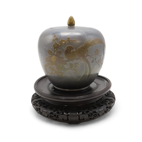 2280 - A CHINESE PEWTER GINGER JARDecorated with brass in relief with birds, 18cm high and with Zitan carve... 