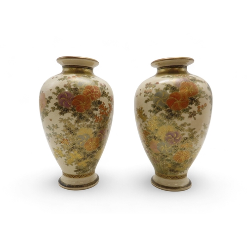 2281 - A PAIR OF SATSUMA VASESPainted with floral sprays and butterflies, beneath a diaper shoulder, signed... 