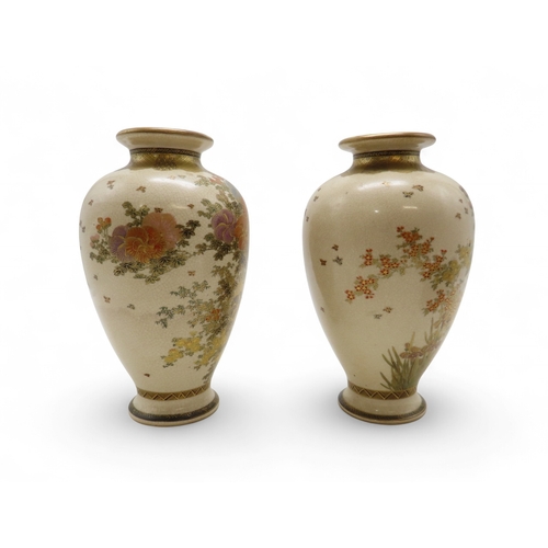 2281 - A PAIR OF SATSUMA VASESPainted with floral sprays and butterflies, beneath a diaper shoulder, signed... 