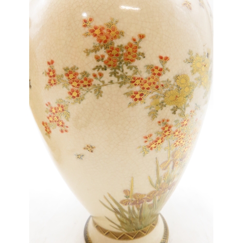 2281 - A PAIR OF SATSUMA VASESPainted with floral sprays and butterflies, beneath a diaper shoulder, signed... 