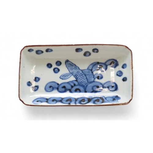 2282 - A JAPANESE BLUE AND WHITE SWEET DISH Painted with a Kashiki carp amongst pond foliage, four characte... 