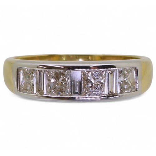 2739 - A PRINCESS CUT DIAMOND RINGthe mount in yellow and white 18ct gold, is set with four princess cut di... 