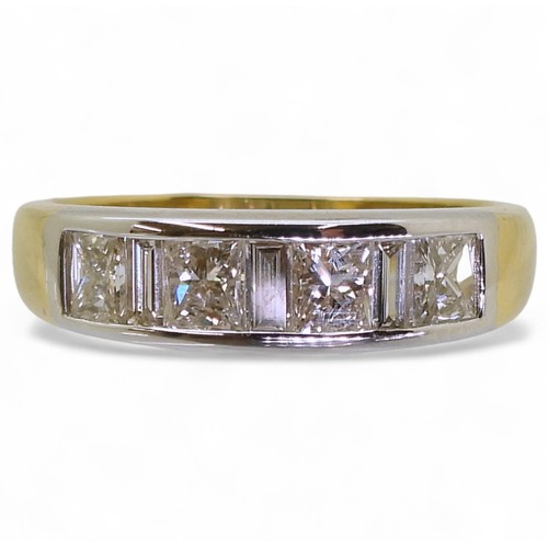 2739 - A PRINCESS CUT DIAMOND RINGthe mount in yellow and white 18ct gold, is set with four princess cut di... 