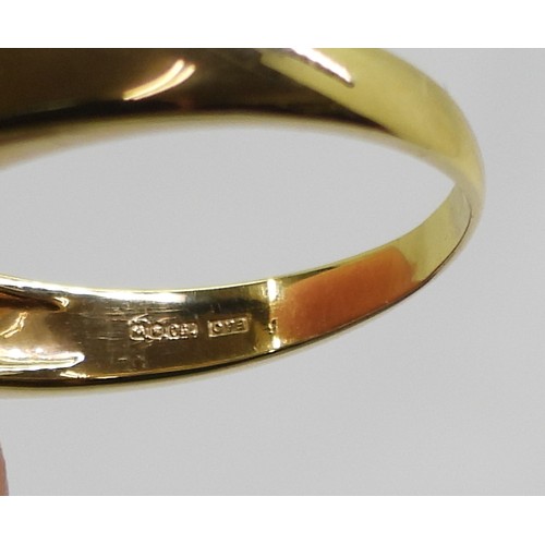 2739 - A PRINCESS CUT DIAMOND RINGthe mount in yellow and white 18ct gold, is set with four princess cut di... 