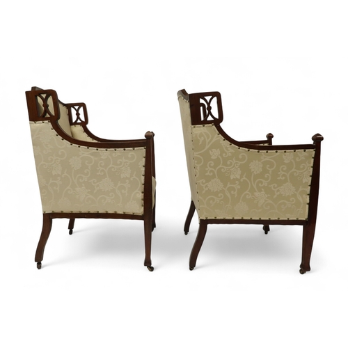 2030 - AN EDWARDIAN MAHOGANY FRAMED THREE PIECE PARLOUR SUITEconsisting two seater settee, 94cm high x 127c... 