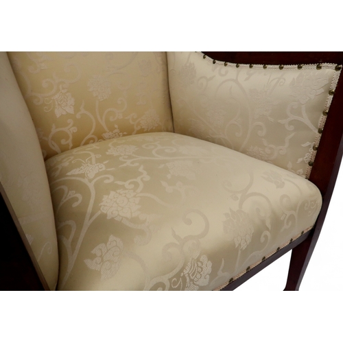 2030 - AN EDWARDIAN MAHOGANY FRAMED THREE PIECE PARLOUR SUITEconsisting two seater settee, 94cm high x 127c... 