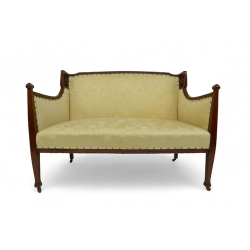 2030 - AN EDWARDIAN MAHOGANY FRAMED THREE PIECE PARLOUR SUITEconsisting two seater settee, 94cm high x 127c... 