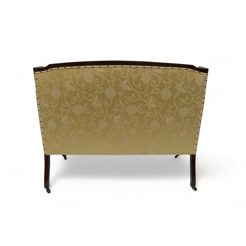 2030 - AN EDWARDIAN MAHOGANY FRAMED THREE PIECE PARLOUR SUITEconsisting two seater settee, 94cm high x 127c... 