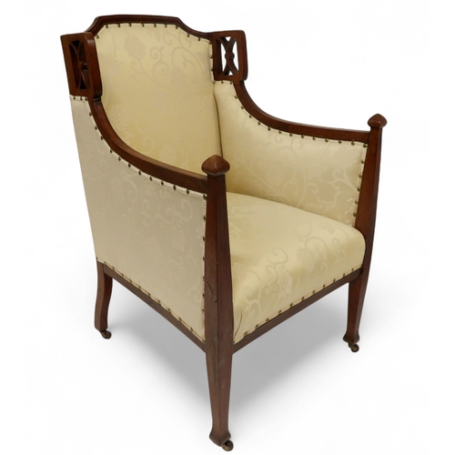 2030 - AN EDWARDIAN MAHOGANY FRAMED THREE PIECE PARLOUR SUITEconsisting two seater settee, 94cm high x 127c... 