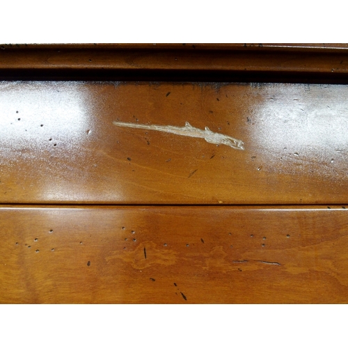 2032 - A 20TH CENTURY CHERRY WOOD AND SO TO BED TWO DOOR WARDROBEwith moulded corned over pair of panel war... 