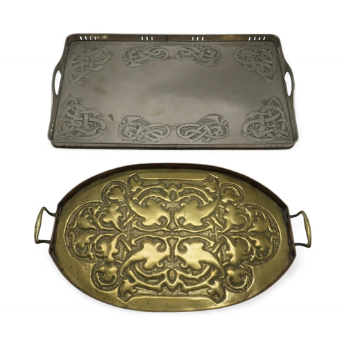 2211 - A GLASGOW SCHOOL WHITE METAL TRAYof rectangular form decorated with Celtic knotwork beasts, 35.5cm x... 