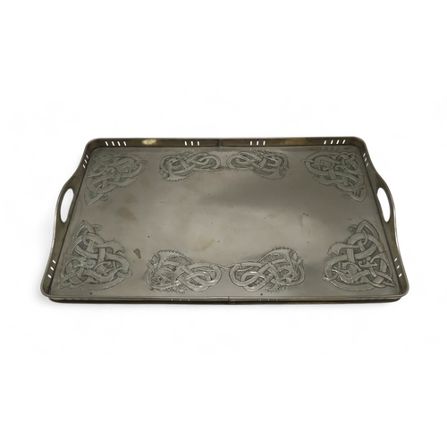 2211 - A GLASGOW SCHOOL WHITE METAL TRAYof rectangular form decorated with Celtic knotwork beasts, 35.5cm x... 