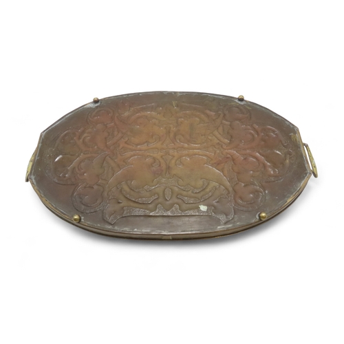 2211 - A GLASGOW SCHOOL WHITE METAL TRAYof rectangular form decorated with Celtic knotwork beasts, 35.5cm x... 