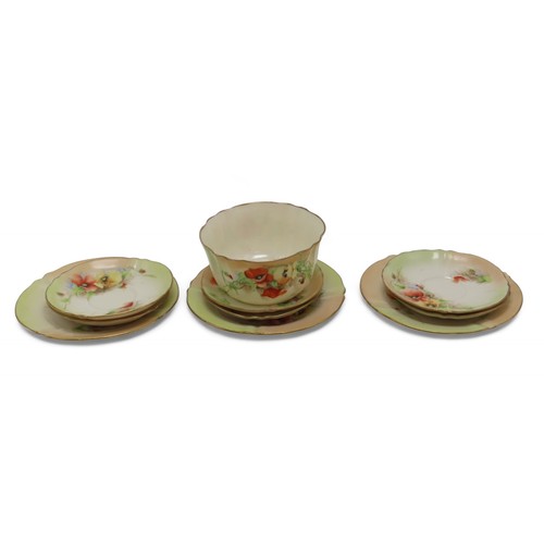 2210 - NAUTILUS PORCELAIN COFFEE WARESdecorated with poppies, comprising six cups, twelve saucers, nine pla... 