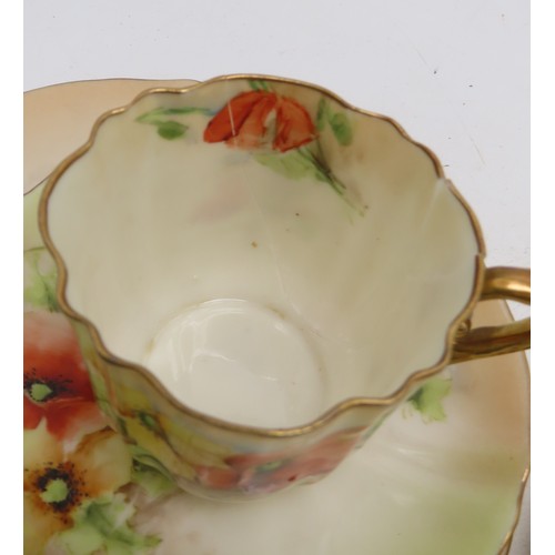 2210 - NAUTILUS PORCELAIN COFFEE WARESdecorated with poppies, comprising six cups, twelve saucers, nine pla... 