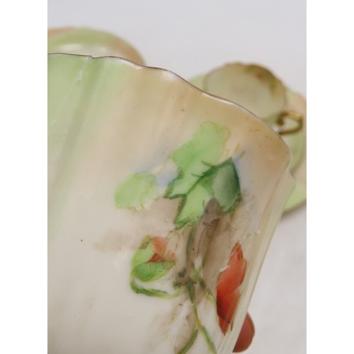 2210 - NAUTILUS PORCELAIN COFFEE WARESdecorated with poppies, comprising six cups, twelve saucers, nine pla... 