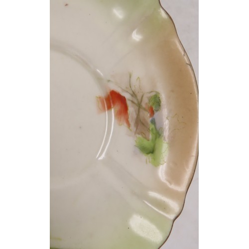 2210 - NAUTILUS PORCELAIN COFFEE WARESdecorated with poppies, comprising six cups, twelve saucers, nine pla... 