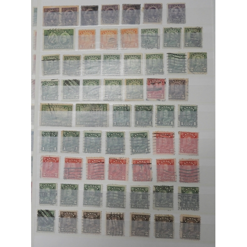 7058 - Canada Collection in a Green Lighthouse Stock Book Mainly used from Queen Victoria Small Heads to QE... 